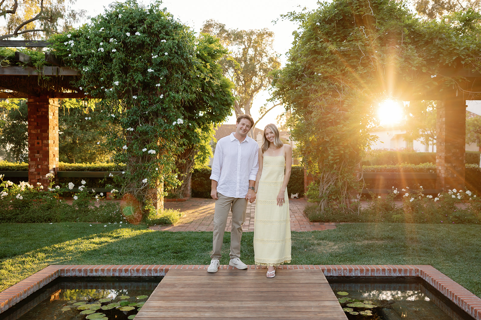 Couple posing during golden hour for their Santa Barbara engagement photos at El Encanto.