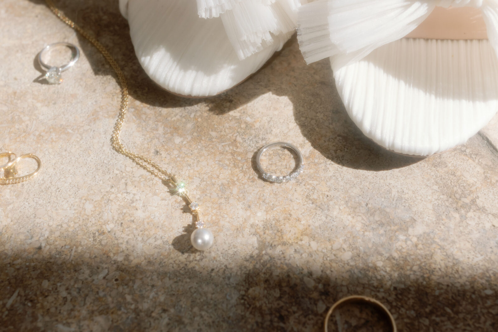 Close up shot of jewelry and shoes from a Southern California wedding