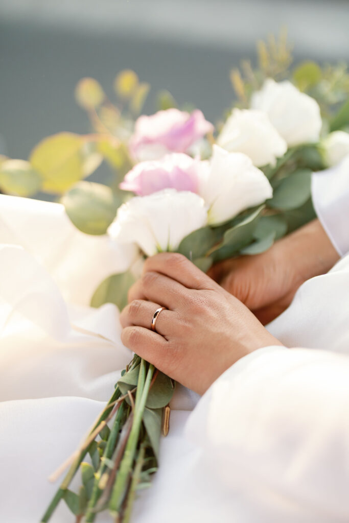 Cloe up shot of a bride holding her wedding bouquet.