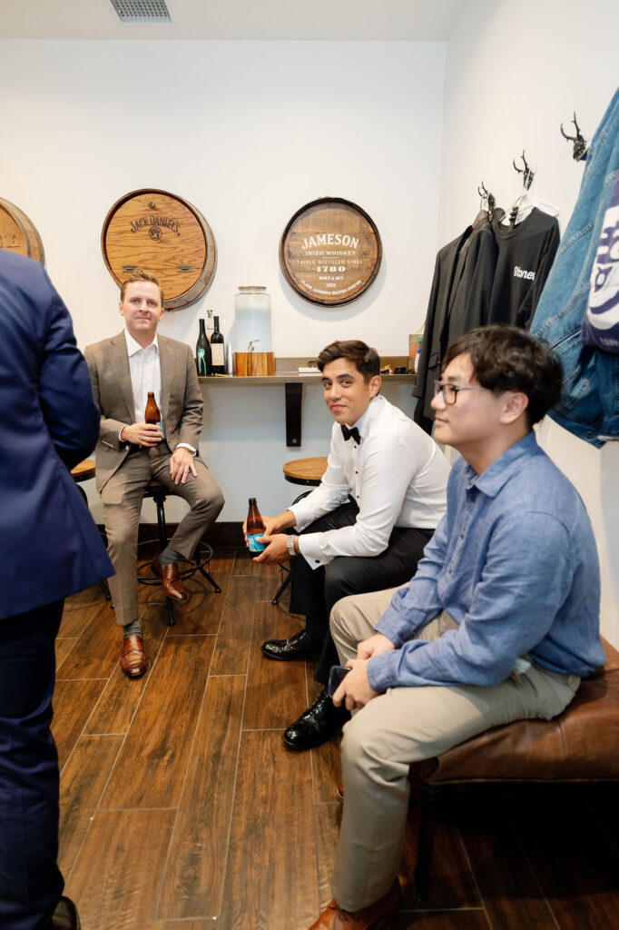Groom and his groomsmen getting ready in the Grooms Lounge at La Ventura Event Center in San Clemente, CA