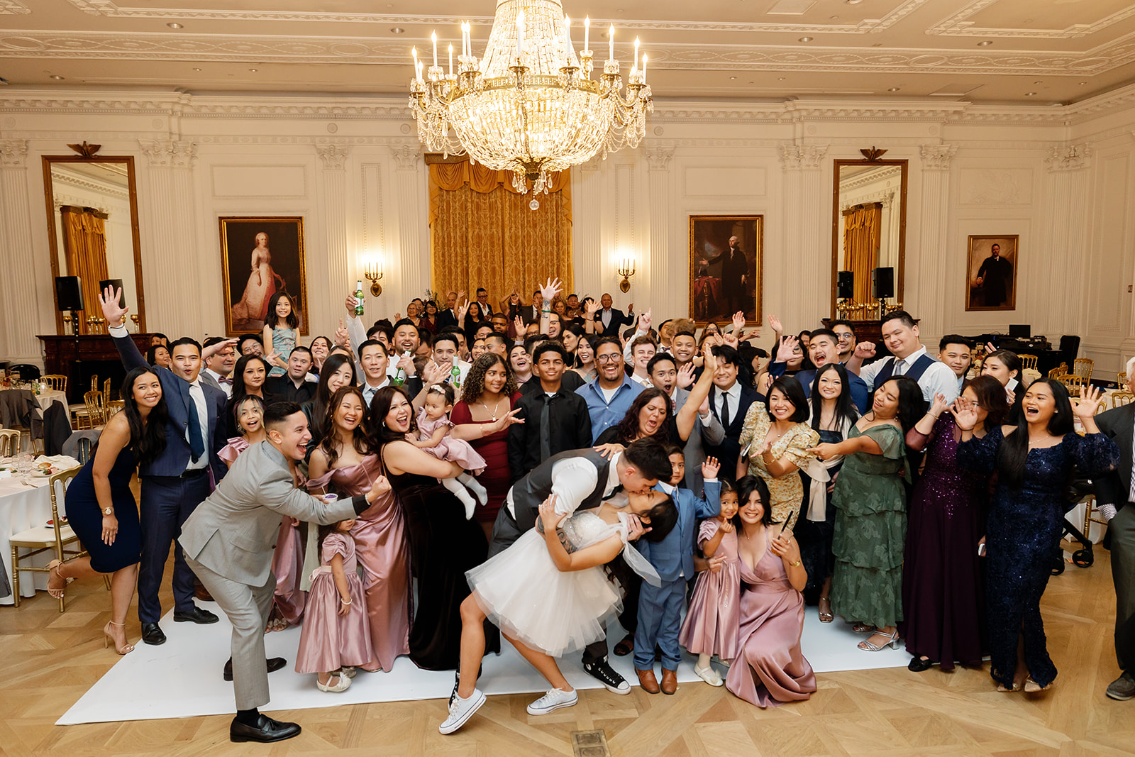 Wide large group shot from a wedding reception at the Nixon Library in Yorba Linda.