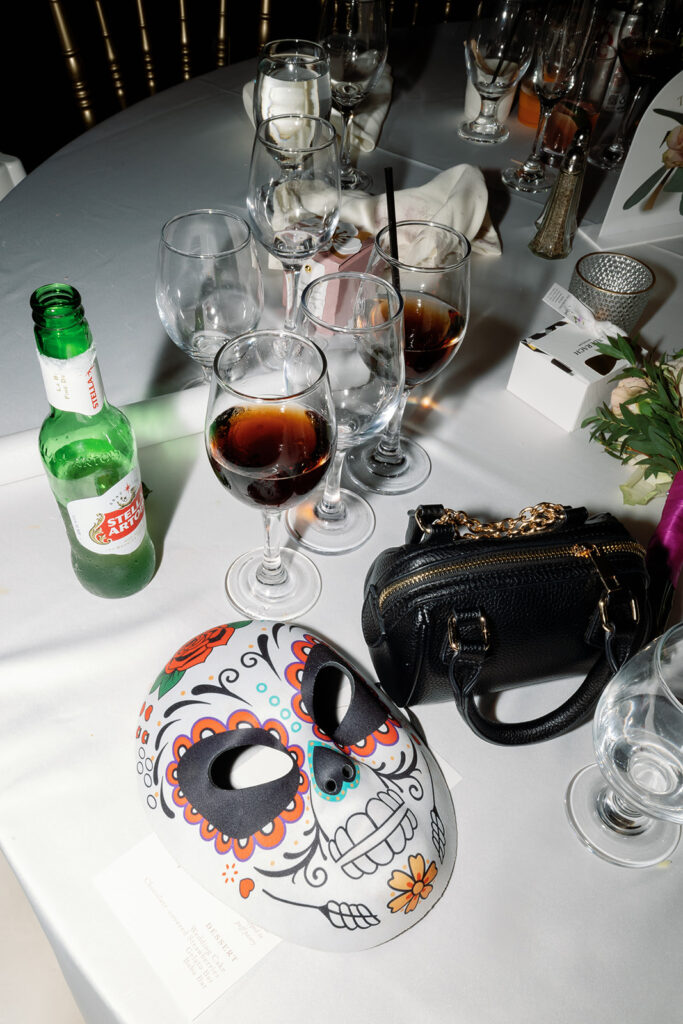 Wedding reception details shot at the end of a lively party.