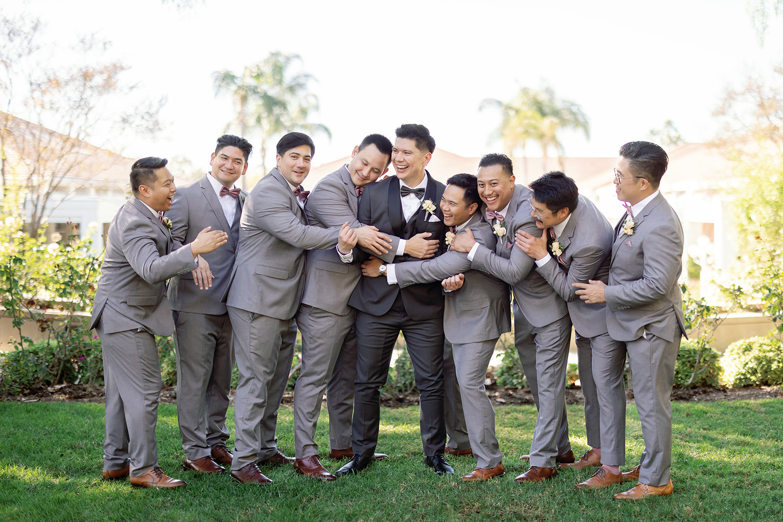 Outdoor groom and groomsmen photo from a Nixon Library Yorba Linda wedding.