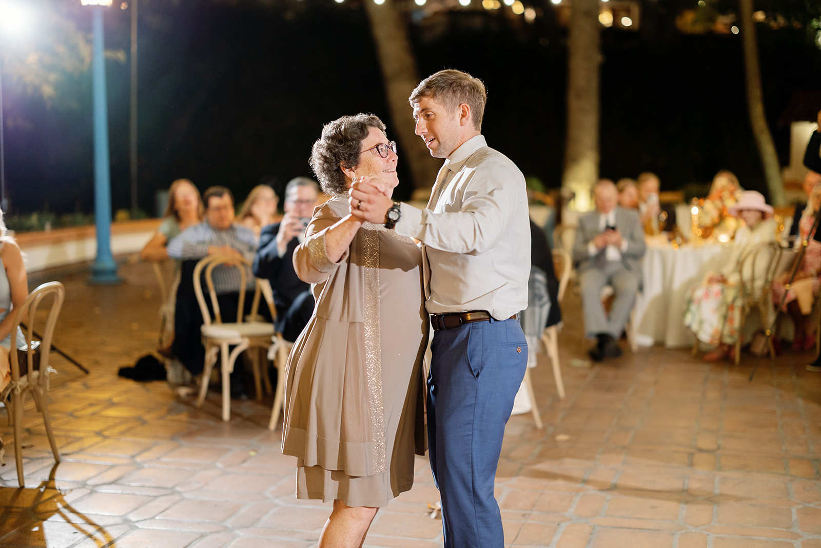 Groom dancing with his mother during the reception.