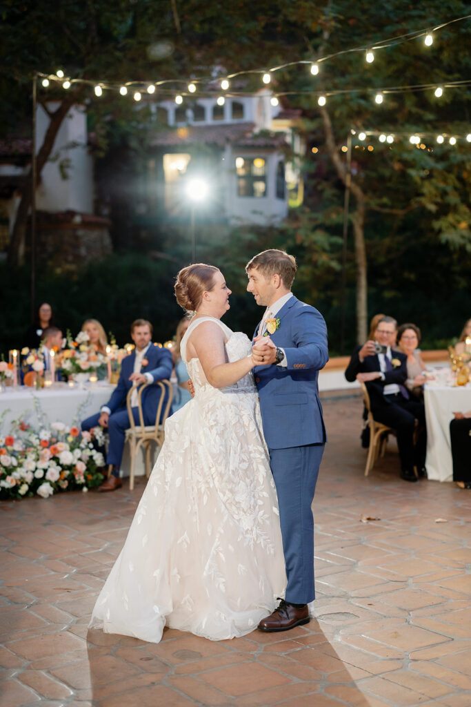 Bride and groom sharing their first dance during their Rancho Las Lomas wedding in California.