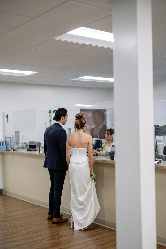 Bride and groom checking in for their Laguna Hills Civic Center elopement.