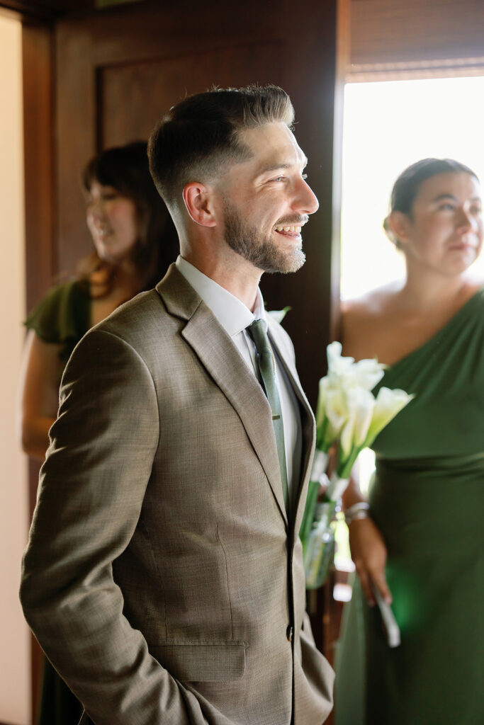 Groomsmen getting emotional seeing the bride.