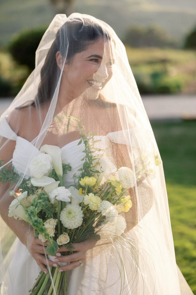 Bride portrait with veil and bouquet at Swanner House wedding in San Juan Capistrano.