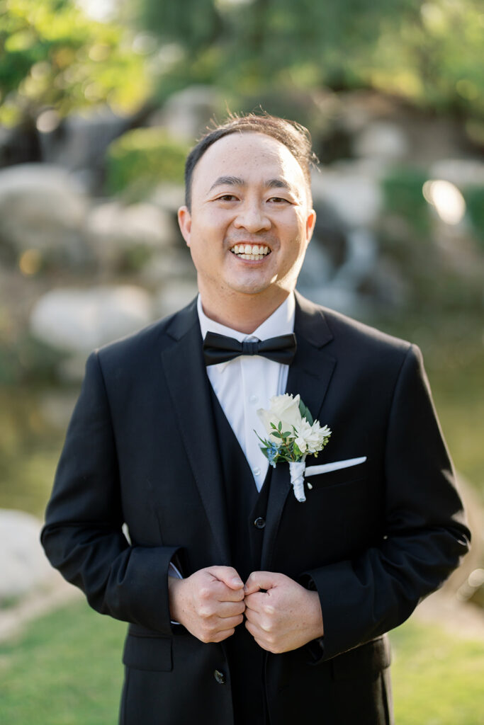 Outdoor grooms portrait during golden hour.
