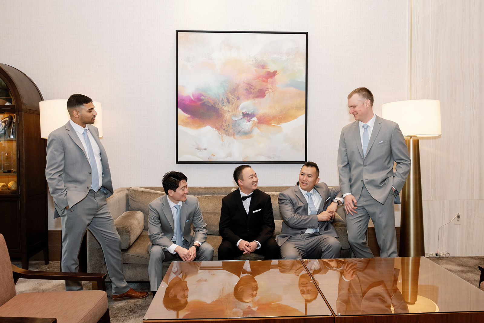 Indoor groom and groomsmen photo at the hotel.