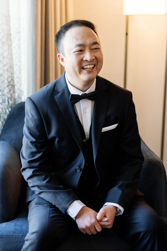 Indoor grooms portraits at the hotel.