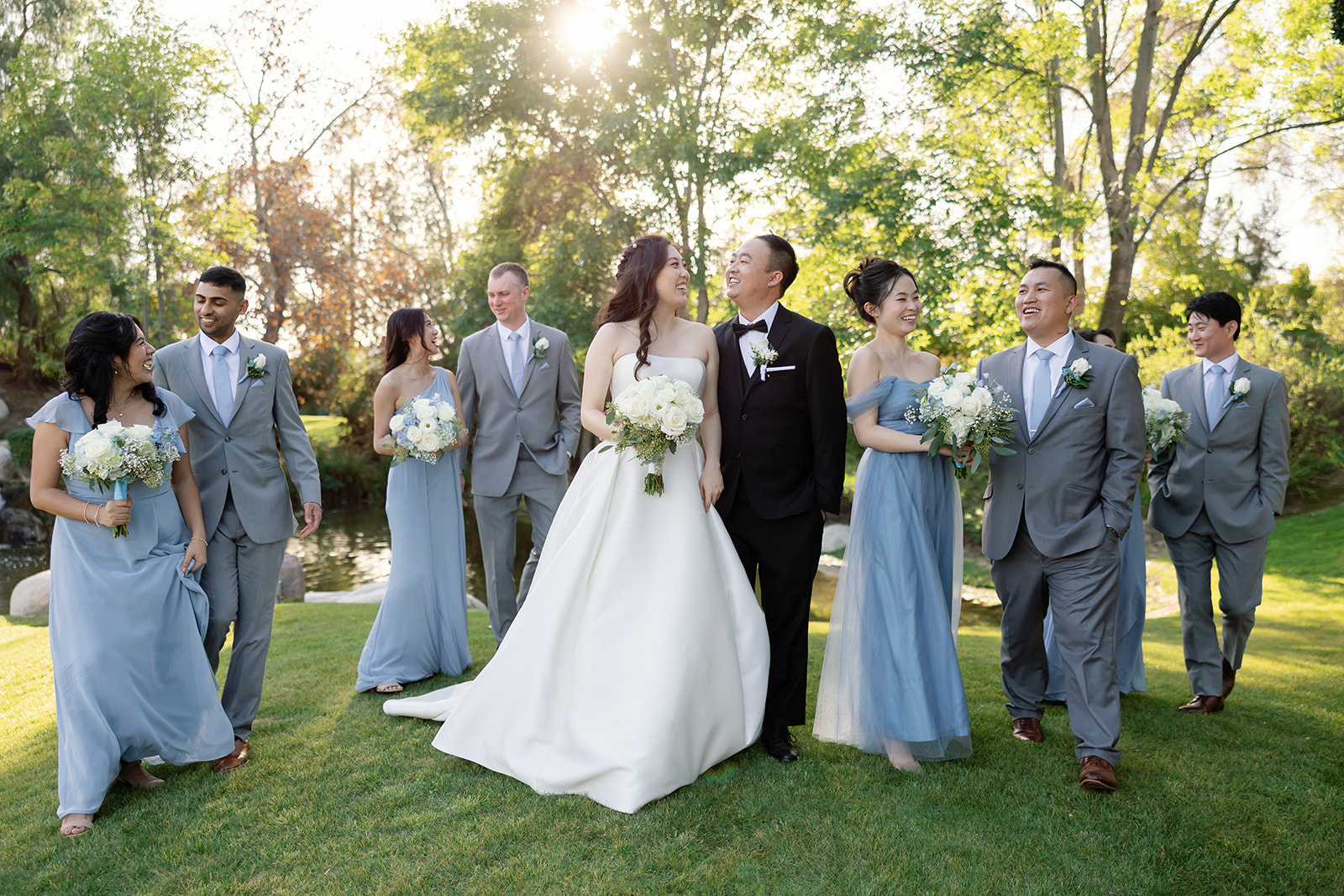 Outdoor golden hour wedding party photo at Coyote Hills Golf Course.