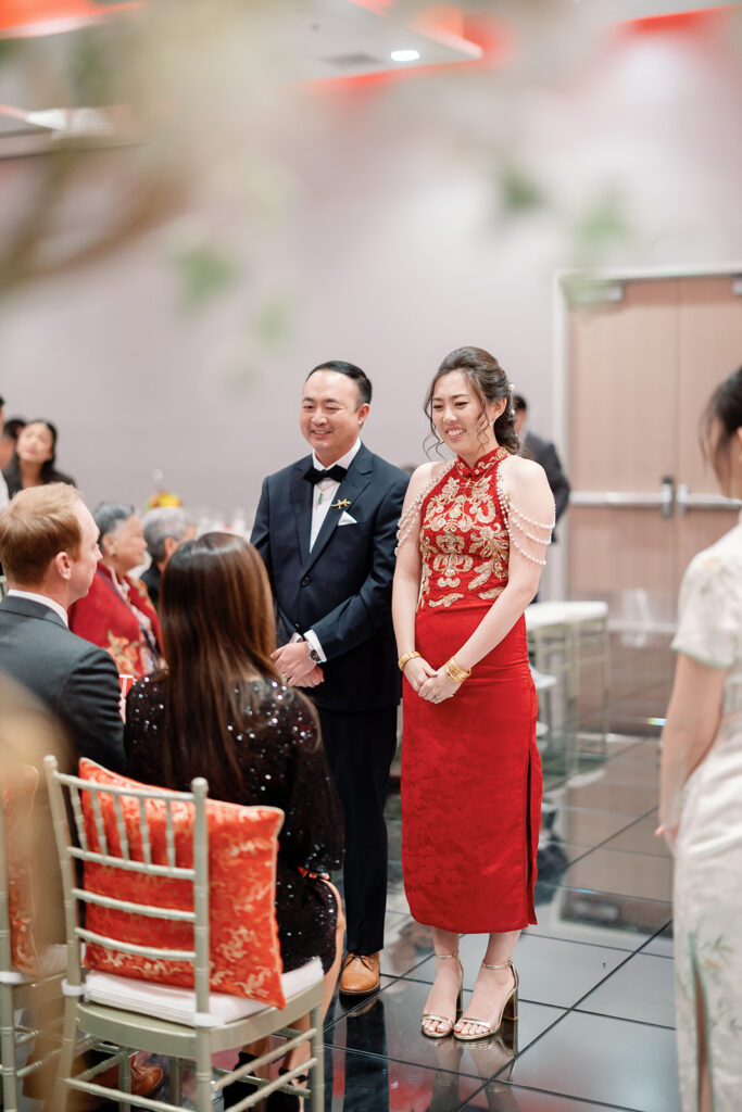 Bride and groom entering their tea ceremony reception at Marriott Los Angeles Monterey Park.