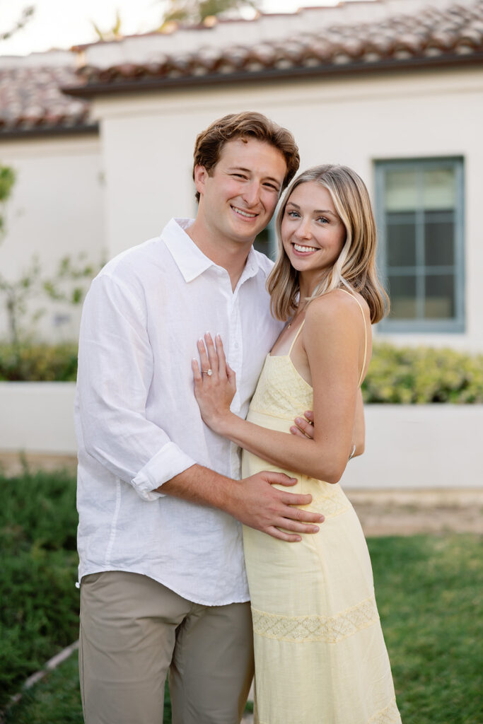 Close up of a couple posing outside of El Encanto.