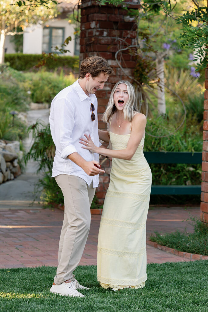 Bride-to-be reacting with surprise after her El Encanto proposal in Santa Barbara.