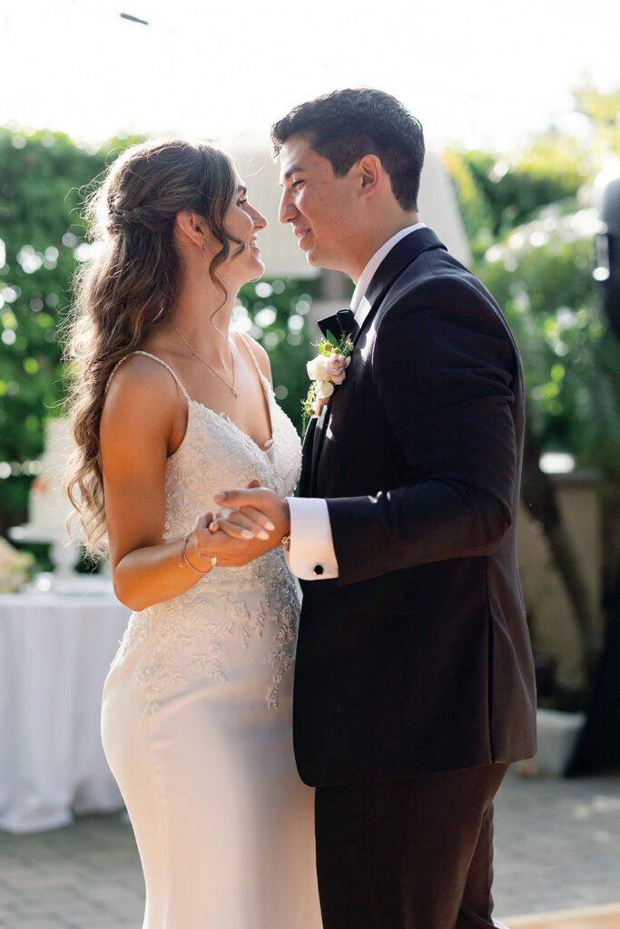 Bride and groom sharing their first dance.