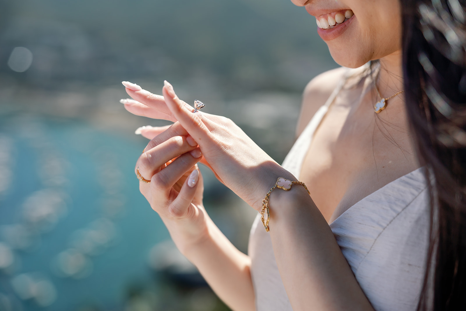 Woman admiring her engagement ring.