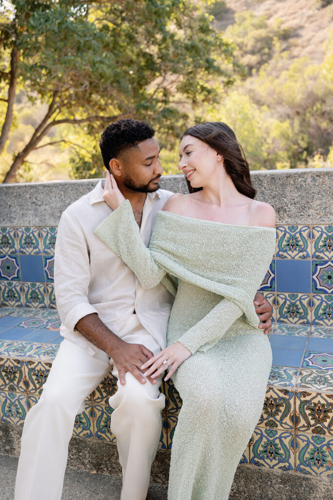 Couple posing for their newly engaged photos at Wrigley Memorial & Botanic Garden.