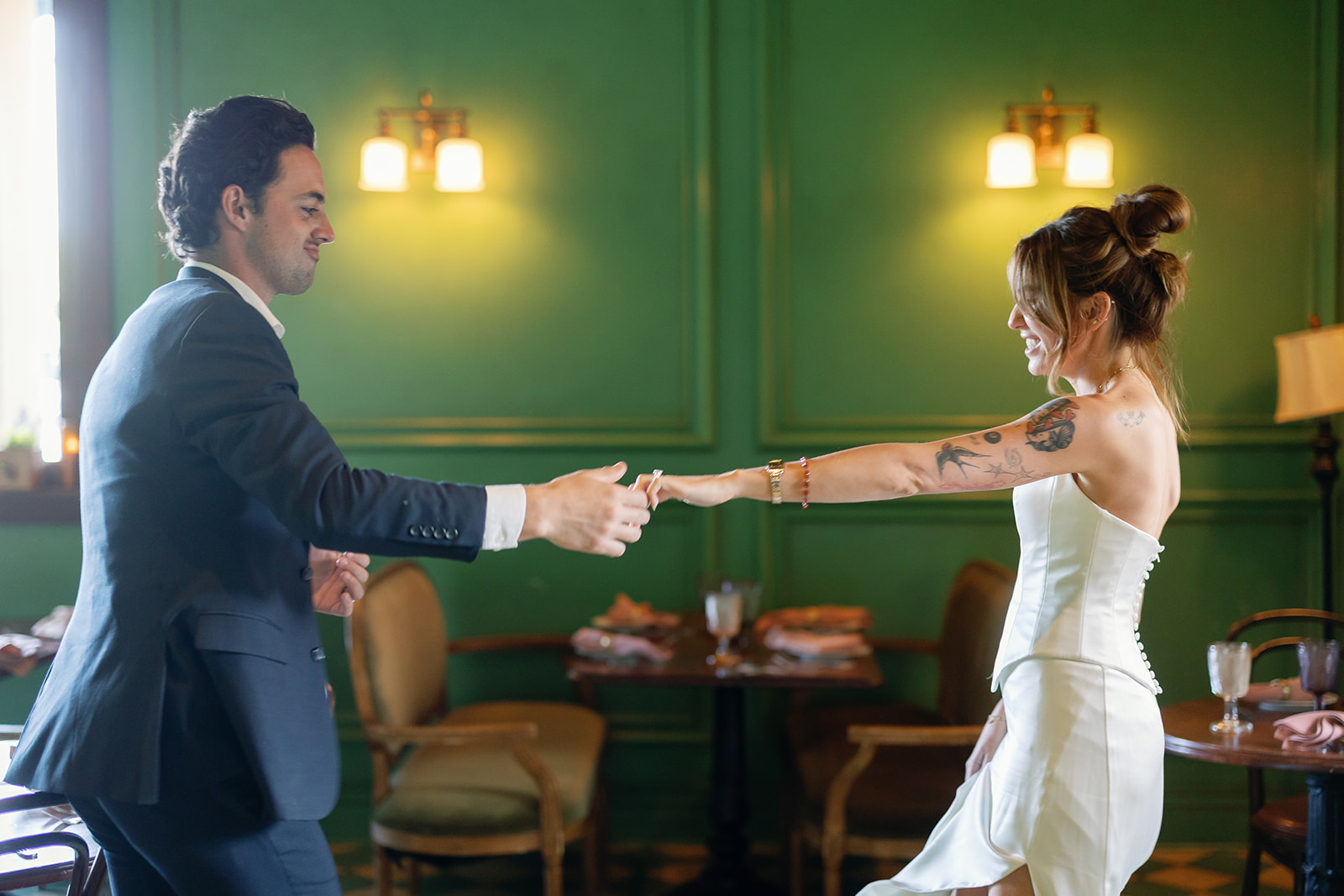 Bride and groom dancing at Habana in Irvine, California after their courthouse wedding.
